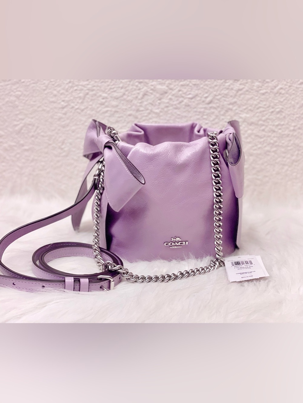 NWT Coach Faye Mini Drawstring Bag With Bows CEL03 in Light Amethyst Leather